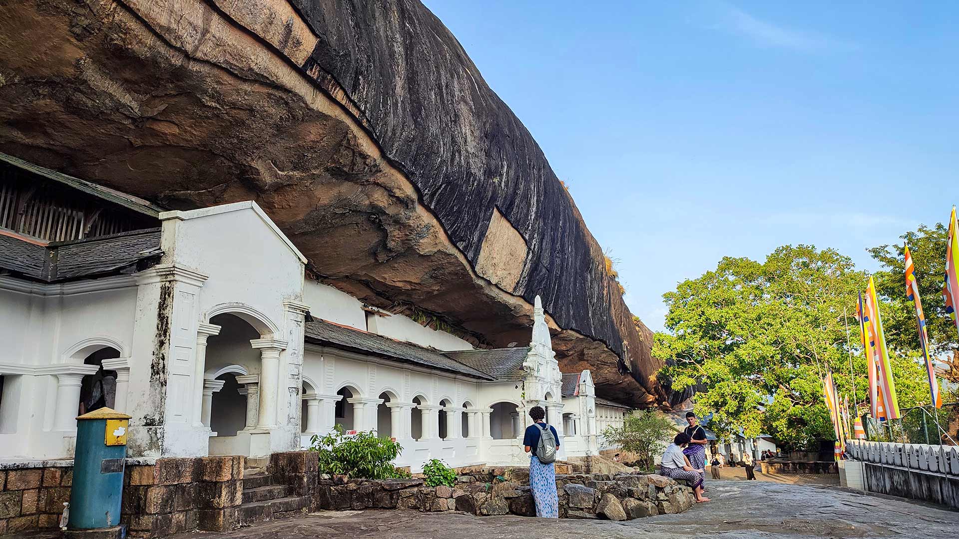 Dambulla Cave Temple built into a massive rock overlooking plains in Central Province Sri Lanka